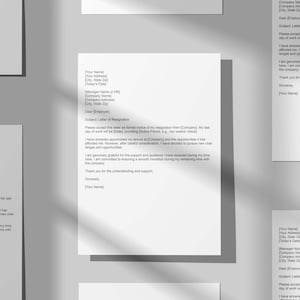 May include: A formal letter of resignation template with a white background and black text. The letter includes a subject line, salutation, and a body paragraph explaining the reason for resignation. The letter concludes with a closing and signature line.