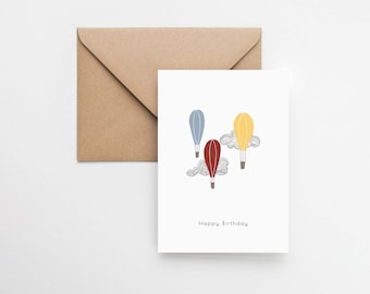 熱気球の誕生日カード：モダンなイラストデザイン