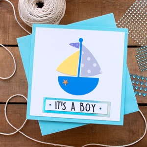 Carte Bateau - Carte Nouveau Bébé Garçon - C'est un garçon - Bébé Bienvenue dans le Monde - Nouvel Arrivage