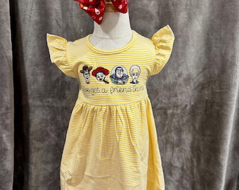 'You’ve Got a Friend in Me' geborduurde romper en jurk met bubbelmotief | Gepersonaliseerde babyoutfit met speelgoedthema