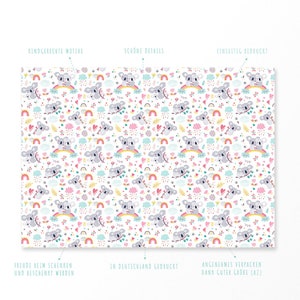 May include: A white background is covered with a repeating pattern of cartoon koalas, rainbows, hearts, and flowers. The koalas are gray and sitting on rainbows. The text in the image includes "KINDGERECUTE MOTIVE", "SCHONE DETAILS", and "LINSELTIG BEDRUCKT".