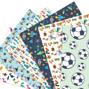 May include: A collection of patterned paper sheets with various designs. The patterns include soccer balls, dinosaurs, vehicles, space themes with rockets and planets, and animal prints. The color palette is bright and playful, featuring blues, greens, and oranges.