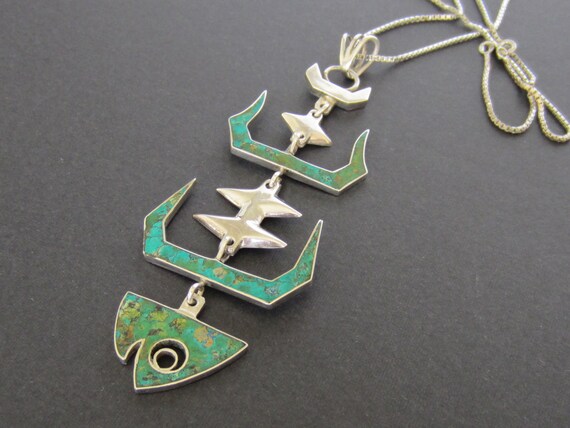 Fish bone store pendant necklace
