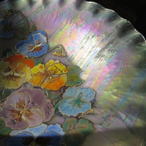 Iridescent, hand painted flowers,glass plate signed by artist