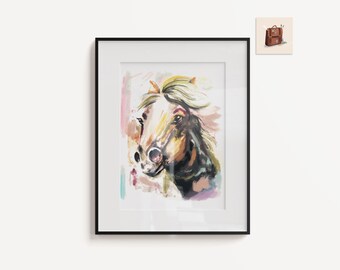 May include: A framed watercolor painting of a horse's head. The horse has a light brown coat with a black mane and tail. The background is a soft pink and blue.