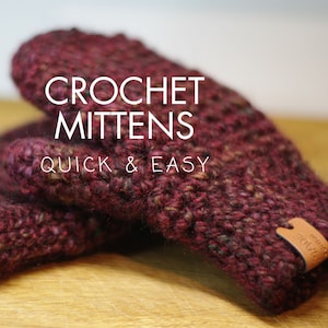 May include: A pair of crocheted mittens in a deep burgundy color with flecks of green and brown. The mittens are made with a textured stitch and have a leather tag that says "JADE" on it. The text "CROCHET MITTENS QUICK & EASY" is superimposed on the image.