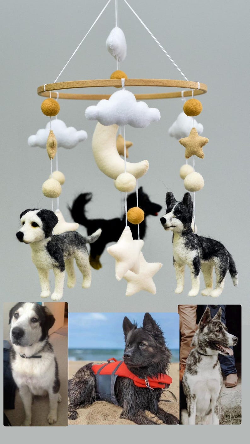 May include: A handcrafted baby mobile with felt dog figures, stars, clouds, and a crescent moon. The mobile is suspended from a wooden ring by white strings. The bottom of the image shows three photos of dogs.
