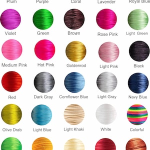 May include: A colour chart of satin nylon cord featuring thirty circular samples in various shades including plum, purple, coral, lavender, royal blue, violet, green, brown, rose pink, light green, medium pink, hot pink, goldenrod, light pink, and black.