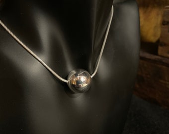 Sterling silver chain with floating bead
