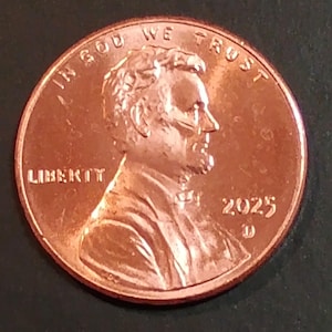 May include: A handmade wooden sign with the text "Welcome" in a playful font. The sign is painted white with a distressed finish, and features a decorative floral design in shades of pink and green. It is designed to be hung on a door or wall.