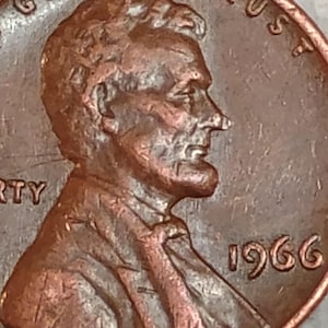 1966 error in nose Lincoln penny die chip in Lincoln&#39;s nose DDO broad struck circulated ungraded L on rim and no mint mark.