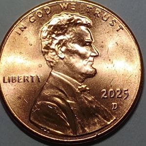 May include: A set of three ceramic mugs with a speckled, matte finish. The mugs are in shades of cream, light gray, and dark gray. Each mug has a simple, minimalist design, perfect for coffee or tea.