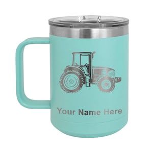 May include: A teal blue stainless steel travel mug with a black tractor graphic and the text "Your Name Here".