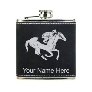 May include: Black leather-wrapped stainless steel hip flask with a silver jockey riding a horse design and the text "Your Name Here".