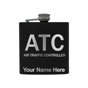 May include: Black flask with a silver cap and a silver inscription that reads "ATC AIR TRAFFIC CONTROLLER" and "Your Name Here".