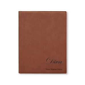 May include: Brown leatherette journal with the word "Diva" and the text "Your Name Here" engraved in black.