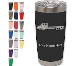 May include: A black insulated tumbler with a silver lid and rim. A white graphic of a flatbed truck is on the front, with the text "Your Name Here" below it. A variety of colored tumblers are displayed to the left.