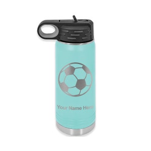 May include: A turquoise stainless steel water bottle with a black lid and a carrying handle. The bottle has a silver soccer ball design and the text "Your Name Here" on the front.