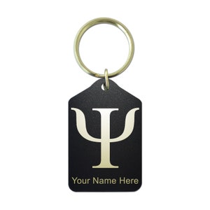 May include: Black metal keychain with a gold Greek letter Psi symbol and the text "Your Name Here".
