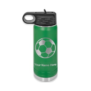 May include: Green stainless steel water bottle with a black lid and handle. The bottle has a silver soccer ball design and the text "Your Name Here" engraved on the side.