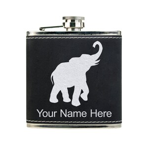 May include: Black leather flask with a white elephant silhouette and the text "Your Name Here".