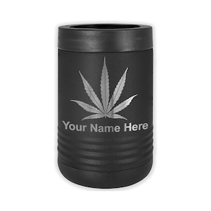 May include: Black stainless steel can cooler with a silver marijuana leaf design and the text "Your Name Here".