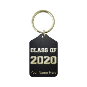 May include: Black keychain with a gold-colored ring. The black tag has the words "CLASS OF 2020" and "Your Name Here" in gold lettering. A graduation-themed accessory.