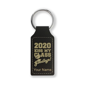 May include: Black leather keychain with a gold inscription that reads "2020 Kiss My Class Goodbye!" and "Your Name".