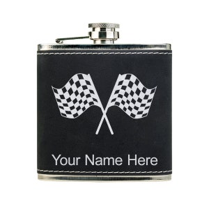 May include: A black leather-wrapped stainless steel flask with a checkered flag design and the text "Your Name Here".