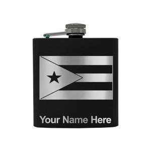 May include: Black stainless steel flask with a silver Puerto Rican flag design and the text "Your Name Here" engraved on the bottom.