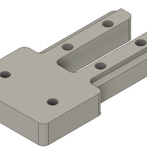 May include: A grey plastic 3D printed part with a rectangular base and two slots. The slots have four holes each.