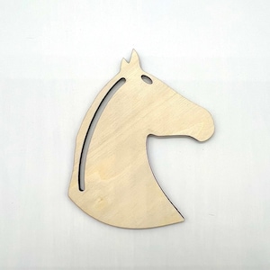May include: Wooden horse head cutout, unfinished and ready to be painted or stained.  The horse head is a simple design with a smooth surface.
