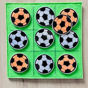 Juego TIC TAC TOE con fijación magnética - Balones de fútbol bordados