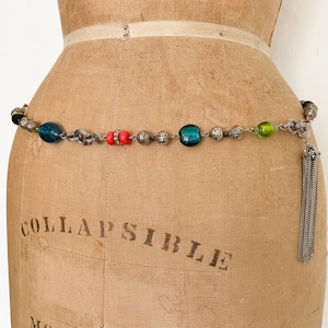Gorgeous vintage 1960’s bohemian chain belt, accented with glass beads and tassel, runway vibes, S