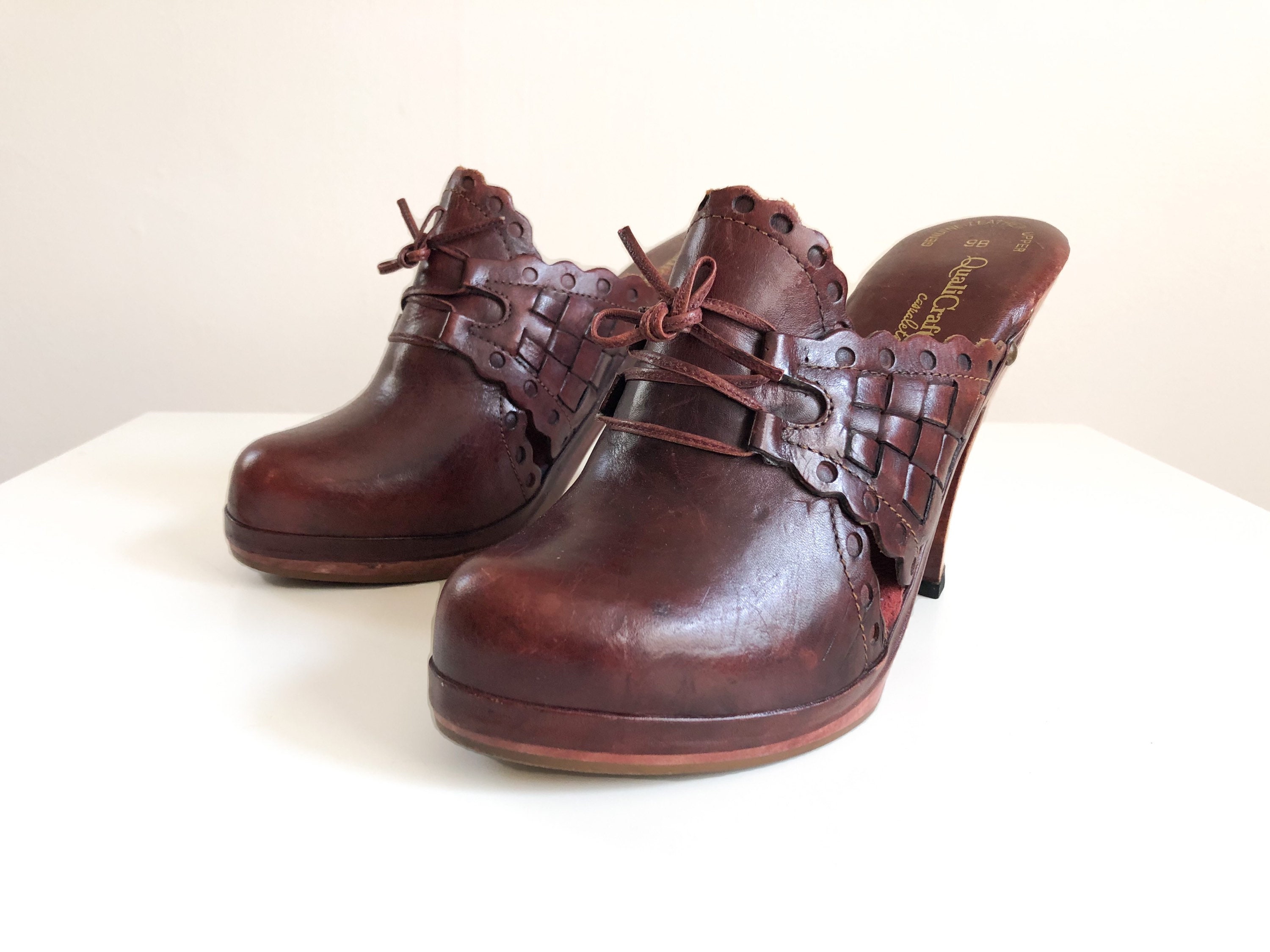woven leather clogs