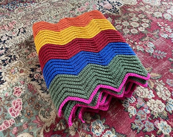 Vintage ‘70s rainbow zig zag crochet afghan, long & narrow lap blanket | colorful handmade throw, hippie, boho, 1970’s aesthetic, 17” x 108”