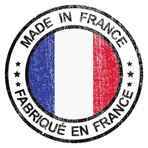 May include: A black and white circular stamp with the text "Made in France" and "Fabriqu&eacute; en France" surrounding a blue, white and red French flag.