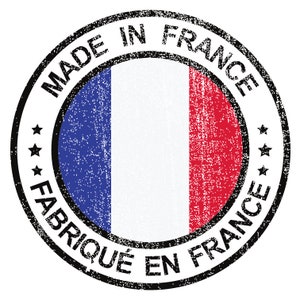 May include: A round, black and white stamp with the text "Made in France" and "Fabriqu&eacute; en France" surrounding a blue, white, and red French flag.