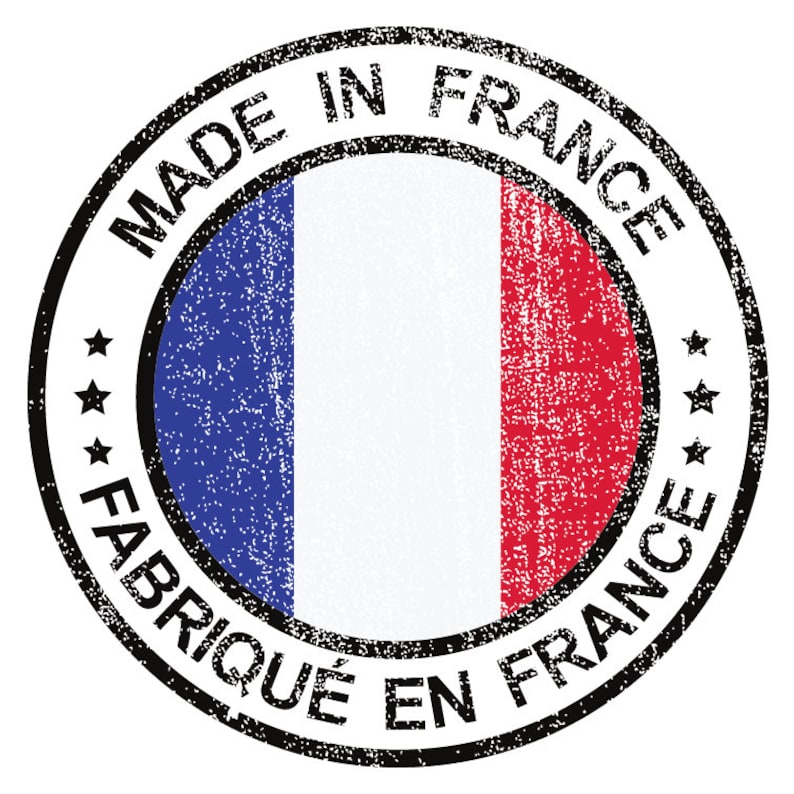 May include: A round, black and white stamp with the text "Made in France" and "Fabriqu&eacute; en France" surrounding a blue, white, and red French flag.