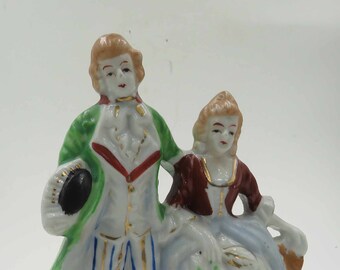 Porcelain Figurine: 18th Century Couple on Bench