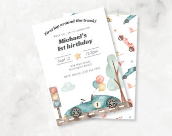 May include: Watercolor-style invitation for a first birthday. The design features a light blue race car, balloons, a traffic light, and the text "First lap around the track!" The invitation includes the name "Michael", the date, time, and location.