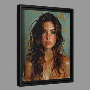 May include: A framed oil painting on canvas depicting a portrait of a person with long, wavy dark brown hair, light skin, and hazel eyes. The background features textured brushstrokes in shades of blue, teal, and gold, set in a black frame.