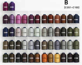 May include: A collection of 50 spools of thread in various colors, labeled C051 through C100. The spools are arranged in a grid pattern in a clear plastic container.