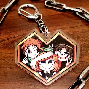 Living Playground: The Witch&#39;s Puppets 2&quot; Double-Sided Acrylic Charm