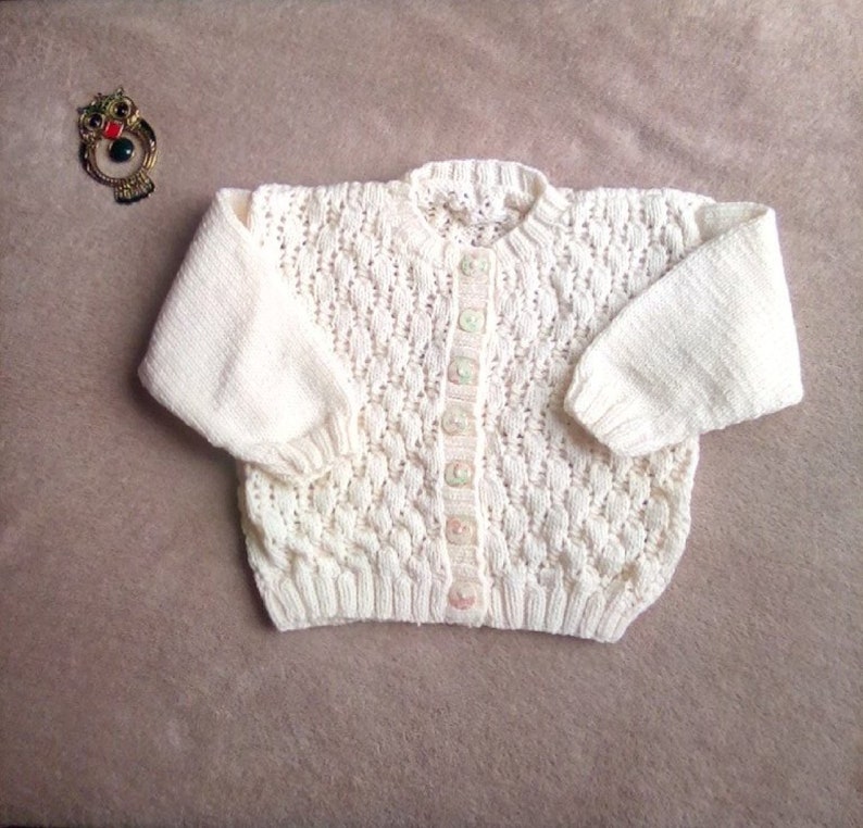 cream coloured cardigan