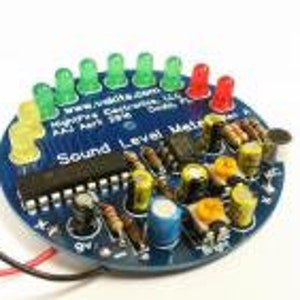 May include: A blue circuit board with a sound level meter. The meter has 10 LEDs, 3 red, 3 green, and 4 yellow. The board has text that reads "Sound Level Meter" and "www.soundbits.com".