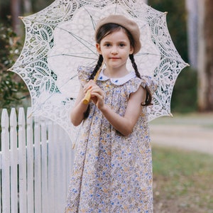 Bishop Blue Butterfly Smocked Dress