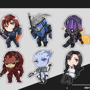May include: A set of six chibi-style stickers featuring characters from Mass Effect. The characters include a human with red hair, a blue-armoured alien with a rifle, a purple-hooded figure, a red-armoured alien, a blue-skinned alien, and a woman with black hair.