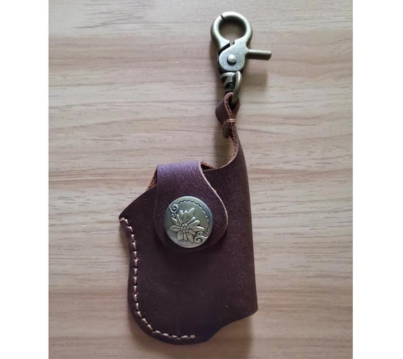 ● OPEN YY ● 25SS STUD LIGHTER CASE KEYCHAIN OPEN YY: Black Stud Lighter Case Keychain | SSENSE
