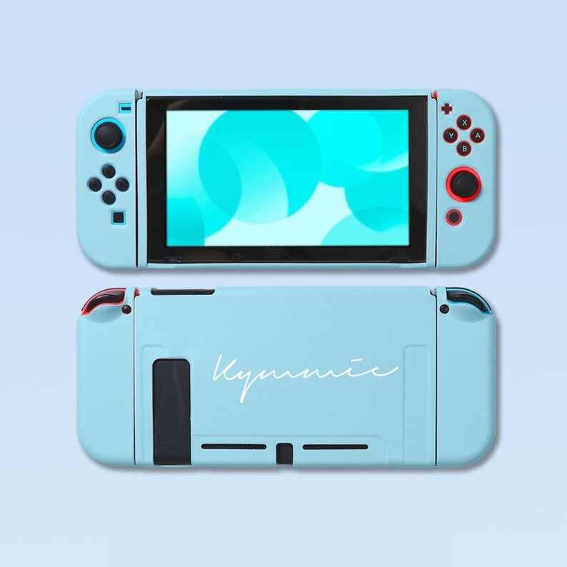 May include: A light blue Nintendo Switch console with a white custom design that says "Kyumiic".